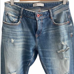 ZARA: Red button distressed jeans